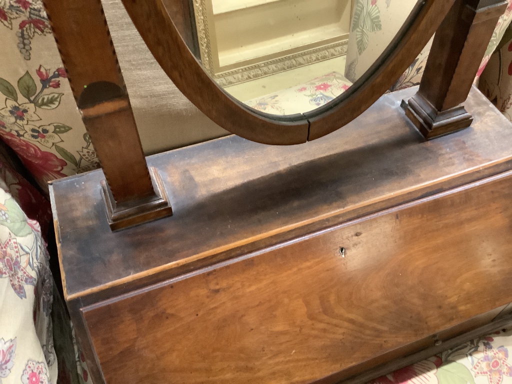 An early 19th century mahogany toilet mirror with bureau base, width 48cm height 76cm